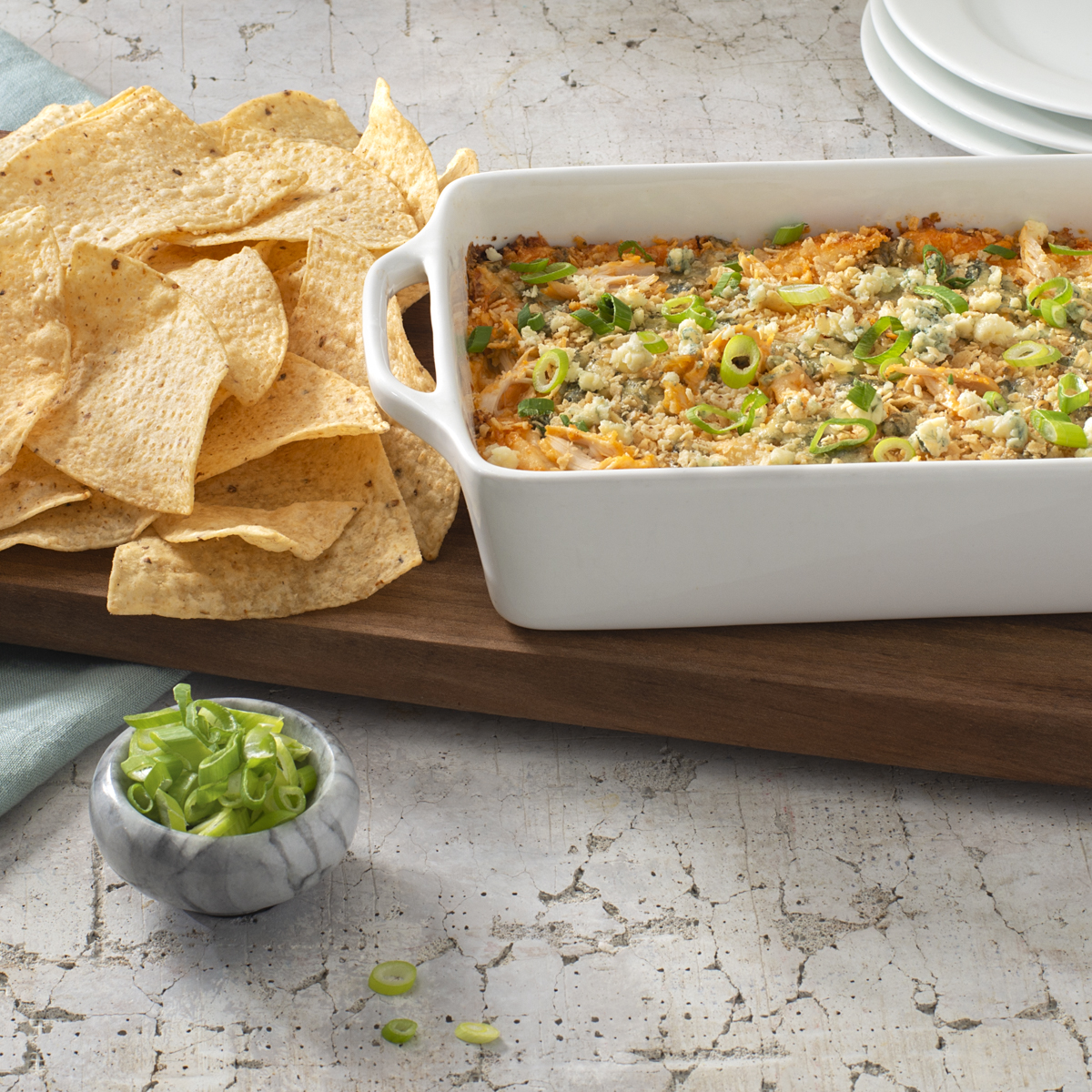 Warm TOSTITOS® Buffalo Chicken Dip & Tortilla Chips